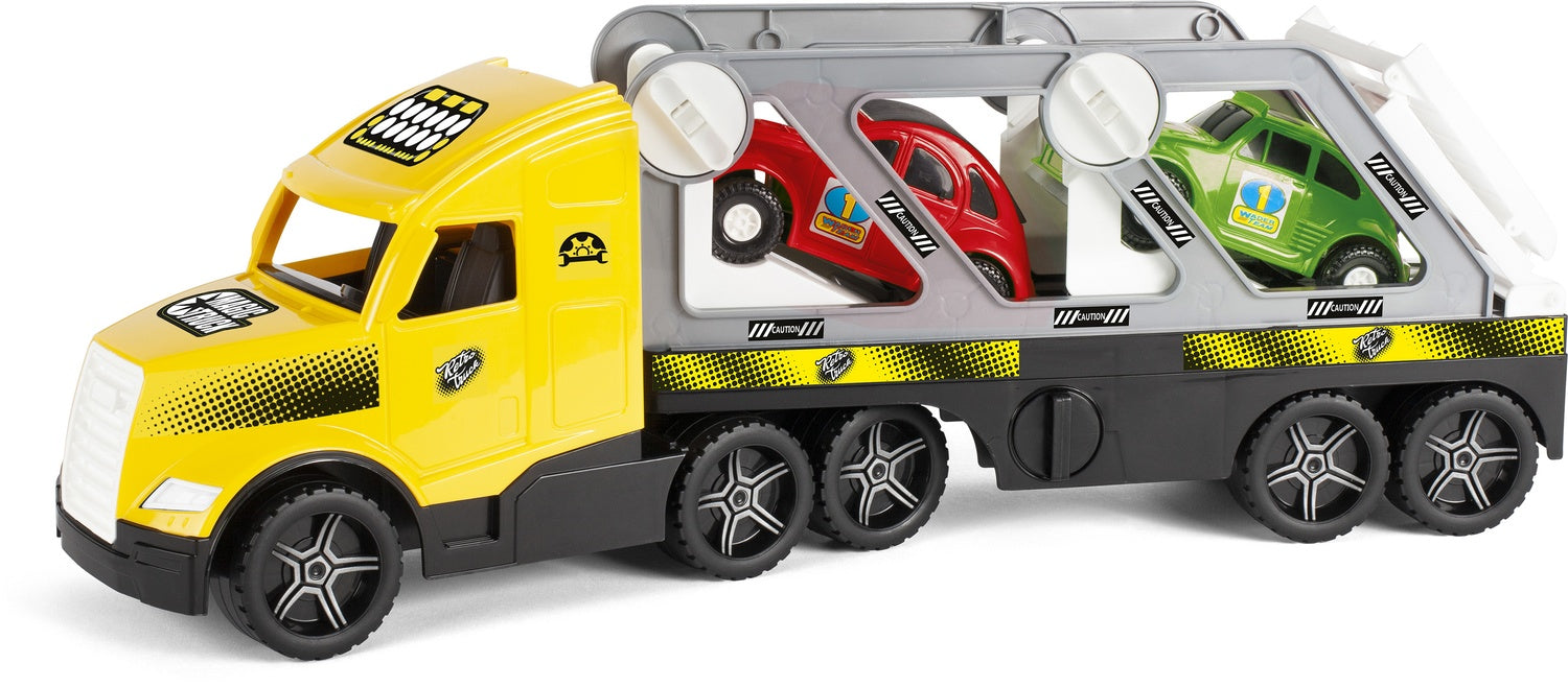 Stor vadarlastbil med släpvagn och retrobilar