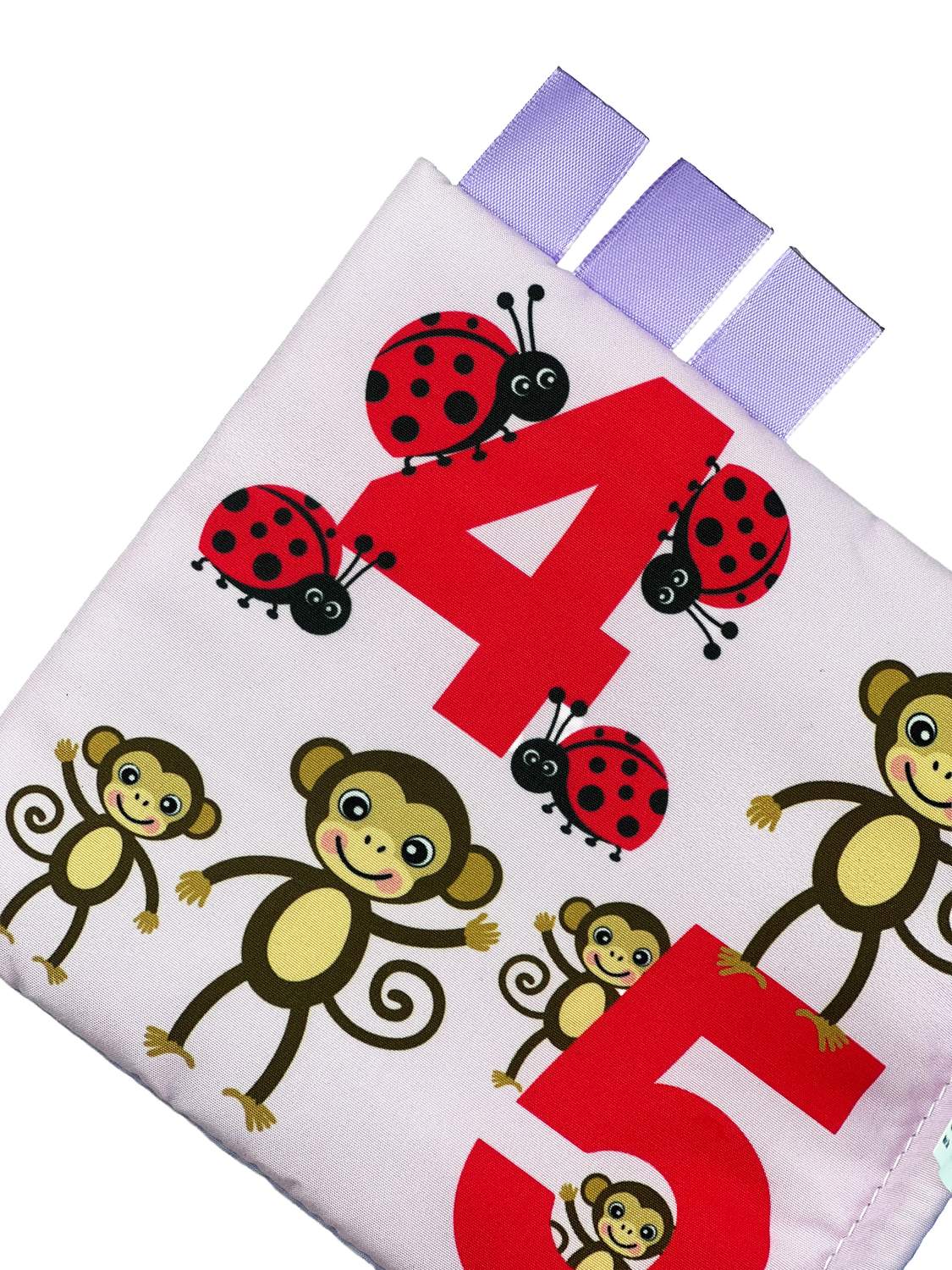 Mjuk babybok med ljusa färger och djurbilder